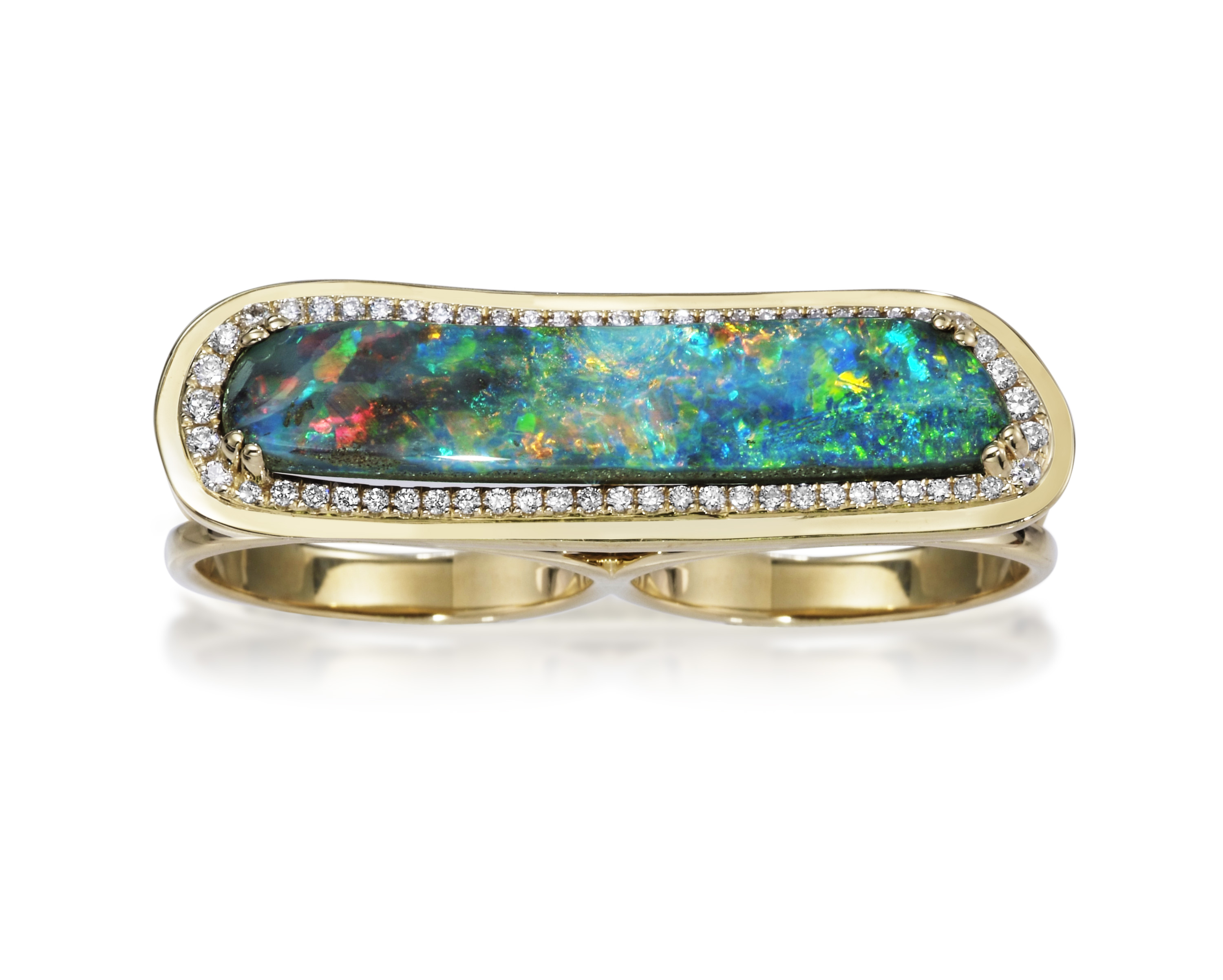 Yellow gold ring set with a long rectangular boulder opal edged in small diamonds