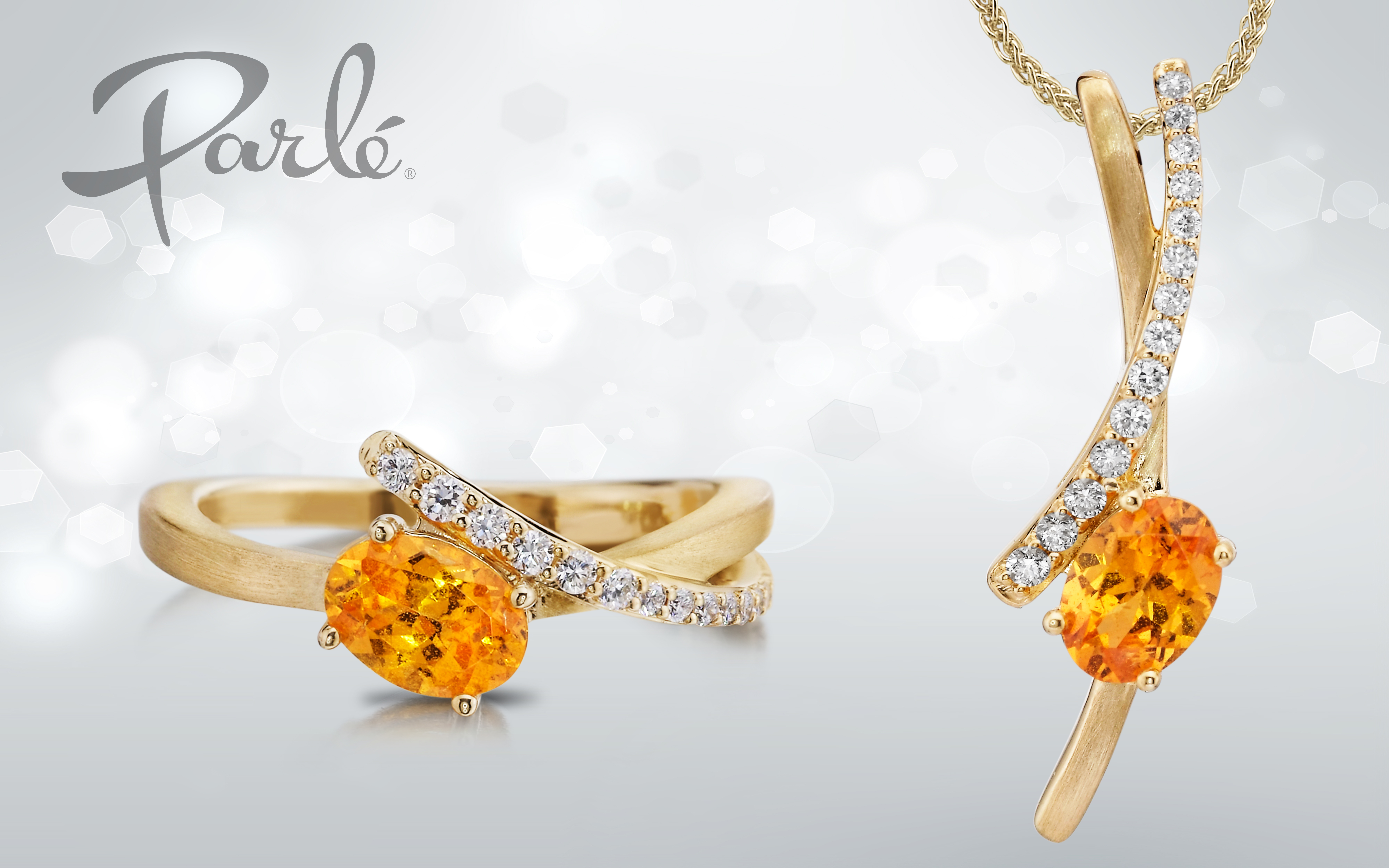 Citrine ring and matching pendant in yellow gold with diamond accents