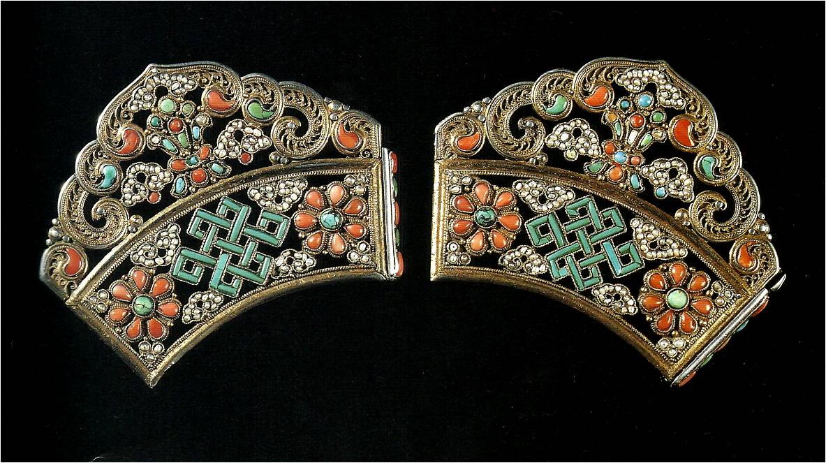 A pair of antique belt ornaments inlaid with turquoise and coral in gold filigree