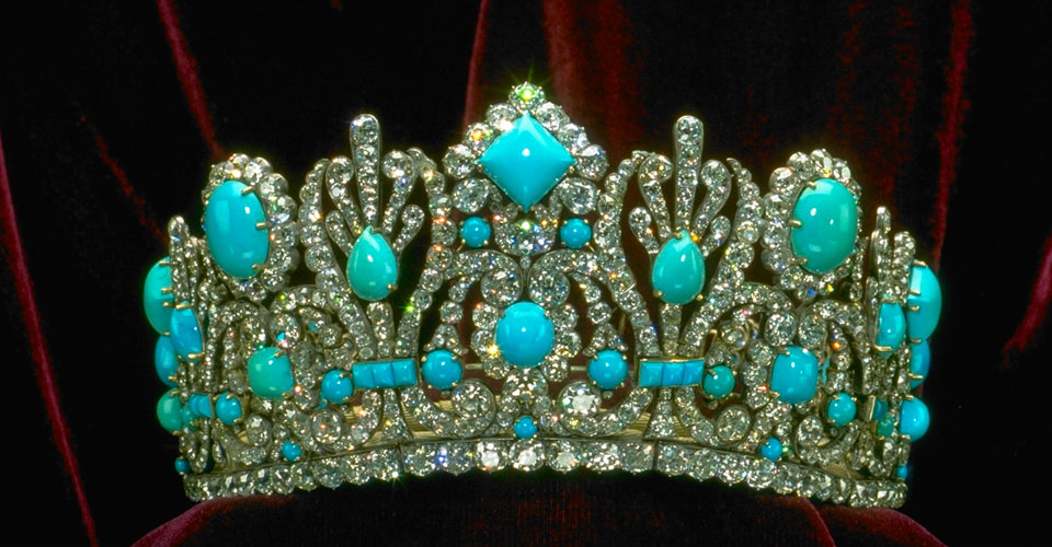 An antique tiara set with turquoise cabochons and diamonds
