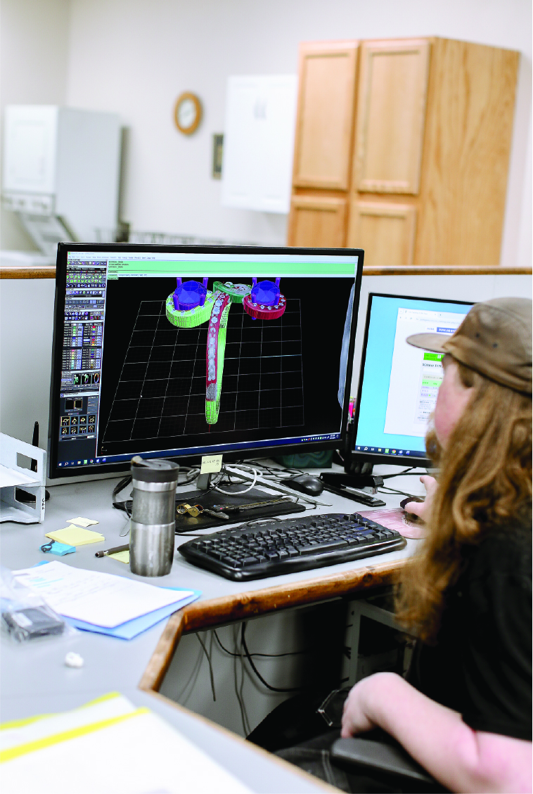Cody doing CAD work on a ring