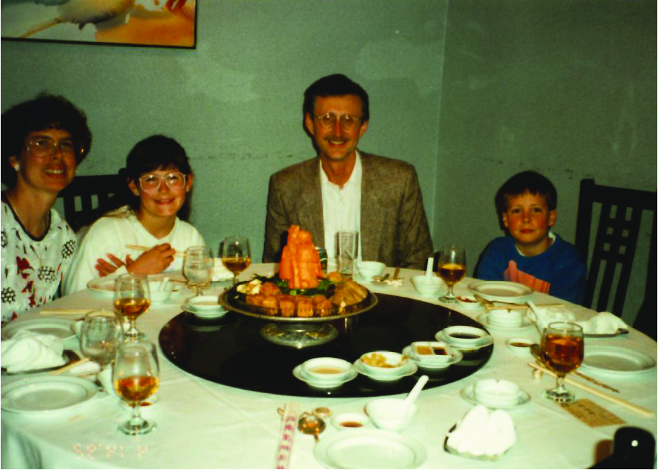 Farnsworth family at dinner in Hong Kong, 1992
